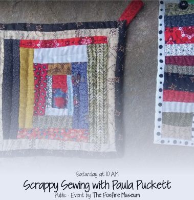 Patchwork quilt hanging on a wall with the text 'Scrappy Sewing with Paula Puckett' - Clayton, GA