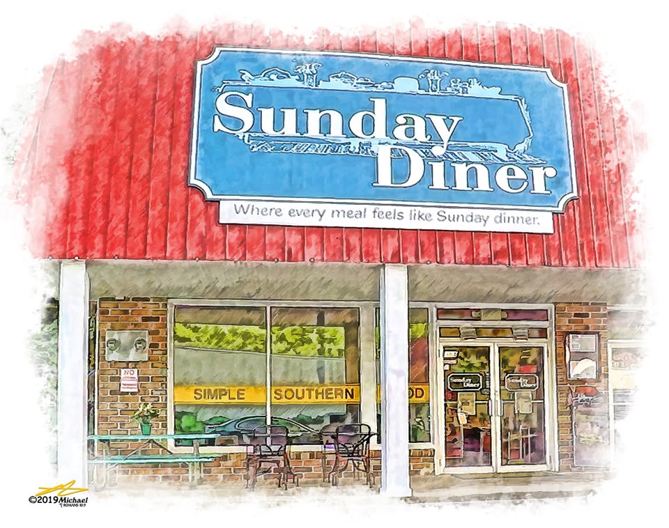 Sunday Diner - Visit Clayton, GA Front view of Sunday Diner storefront with a red awning, blue sign reading 'Sunday Diner' and outdoor seating outside the windows. Tagline: 'Where every meal feels like Sunday dinner.' - Clayton, GA